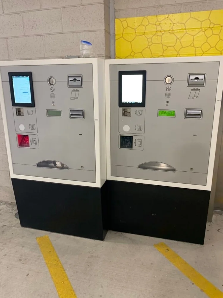 Pay-on-foot parking pay stations installed in a parking garage
